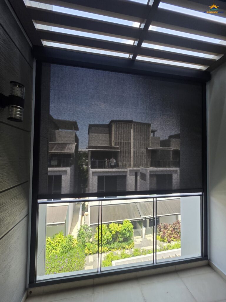 Outdoor motorized zip blind partially lowered, providing shade while maintaining outside visibility.