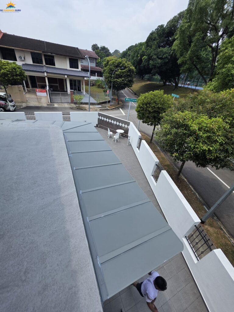 Elevated view of aluminium composite roofing covering the side of a residential property