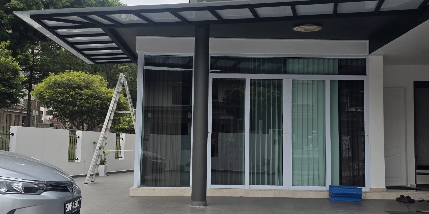 Cantilever aluminium roof installed across the front of a residential property
