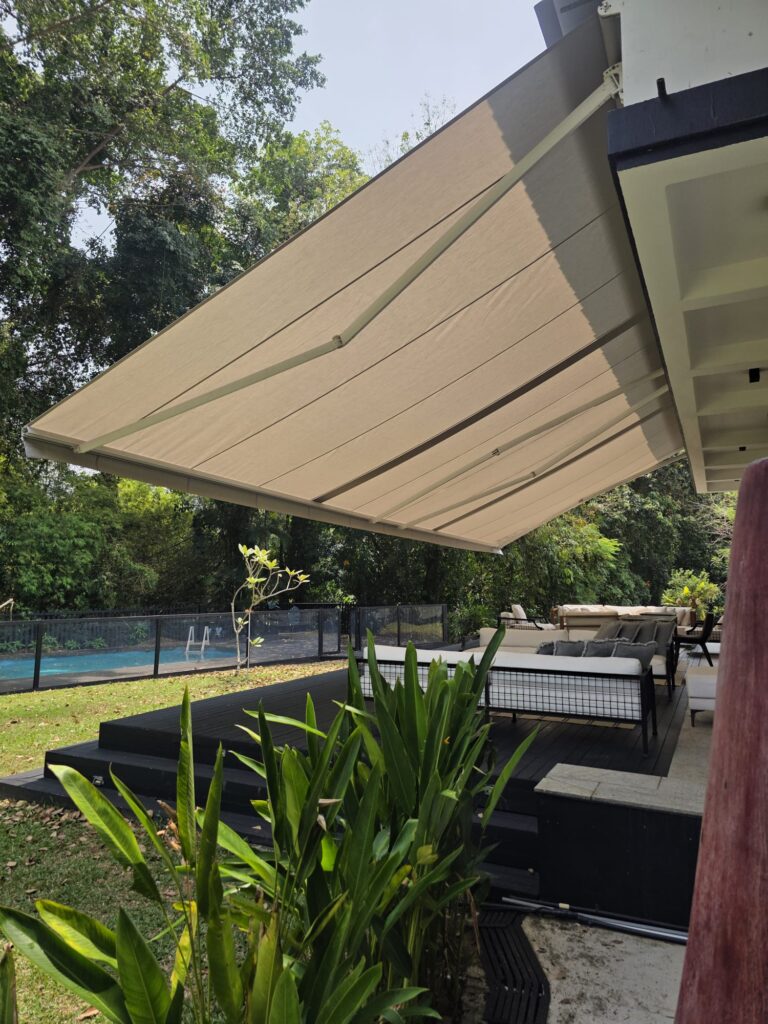 Retracted awning leaving the outdoor patio open to natural sunlight